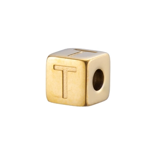 Macro shot of a 14K gold plated stainless steel cube bead with letter T engraving