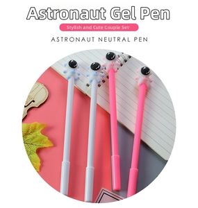 Detail shot of creative astronaut pens with soft silicone charms and fine nib tips