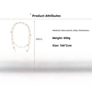 Detail view of 166cm long faux pearl necklace with rhinestone clover motifs