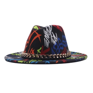 Detail of colorful graffiti art on black wide brim felt jazz hat with gold chain link