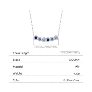 S925 sterling silver necklace featuring a gradient blue gemstone pendant in arc shape