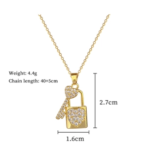 Detailed view of gold heart lock necklace with dimensions and zircon inlay details