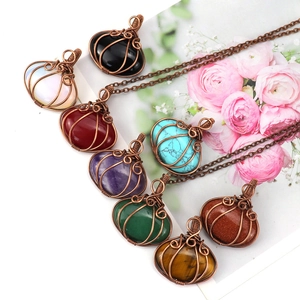 Handmade wire wrapped pumpkin pendants with natural amethyst and tiger eye stones