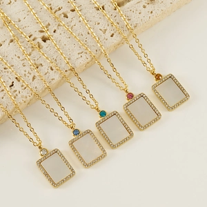 Golden stainless steel necklaces with seashell pendants and colorful birthstones