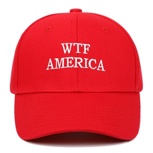 Red baseball cap with white WTF AMERICA embroidery on a clean white background