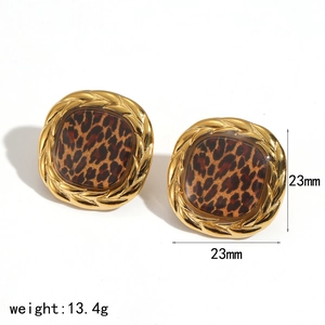 Detail view of square leopard print earrings with gold woven border and dimensions