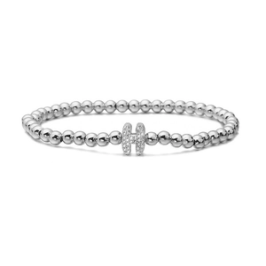 Close-up of silver-plated beaded bracelet with micro-paved zircon letter H charm