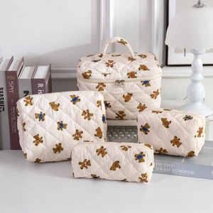 Quilted bear print cosmetic bag set with top handle and travel storage organizers