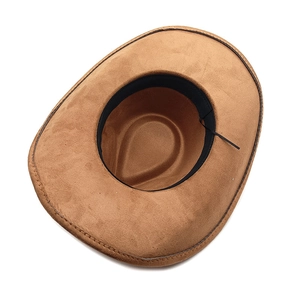 Detail view of the interior sweatband and fine stitching on the brown suede cowboy hat