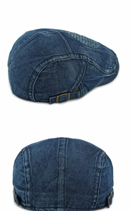 Detailed close-up of washed denim cap showing breathable mesh and adjustable bronze buckle