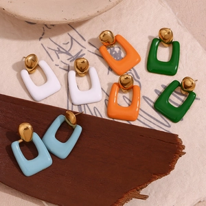Detail of vintage geometric rectangle earrings in colorful enamel and 18K gold plated finish