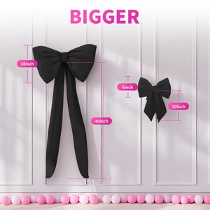 Detail showing two black satin decorative bows in 40-inch and 10-inch sizes for wall decor