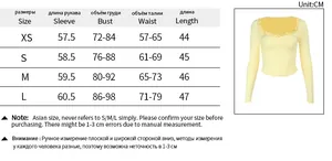 Size chart showing XS to L measurements for the long sleeve ruffle trim top in centimeters