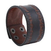 Detail of wide vintage leather bracelet with dual-tone finish and four metal snaps