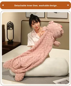 Detailed view of pink plush pig pillow with removable inner liner and soft velvet fabric