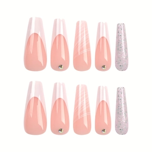 French tip press-on nails with white curves, rhinestones, and silver glitter accents