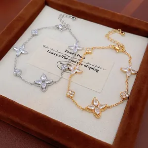 Elegant gold and silver clover bracelets with sparkling zircon star flower charms