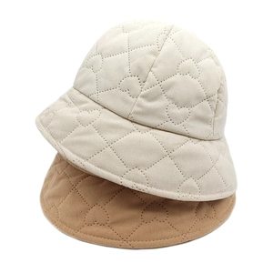 Corduroy heart-quilted bucket hats in beige and camel colors for autumn winter seasons