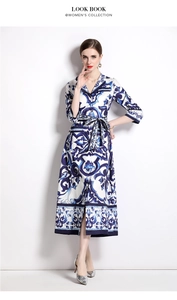 Detailed view of the blue floral pattern and shirt collar on this maxi dress