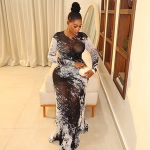 Slim fit long sleeve bodycon dress with black and white artistic print in sheer mesh fabric