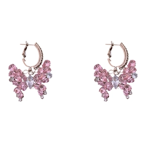 Pink crystal butterfly hoop earrings with rose gold plating and zircon stones on white base