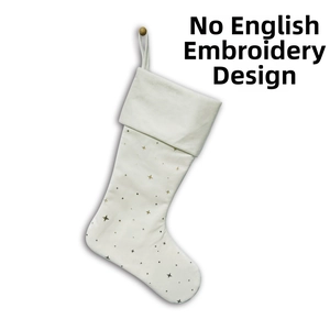 Detail of cream velvet Christmas stocking with gold sequin stars and hanging loop