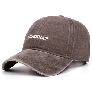 Detailed close-up of a vintage washed cotton baseball cap with white COVENRAT embroidery