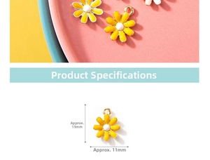 Detail of yellow daisy charm with gold ring showing 15mm by 11mm dimensions
