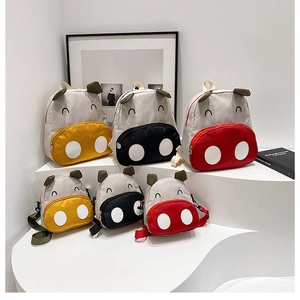 Cute cartoon animal backpacks and cross-body bags for toddlers in red, yellow, and black