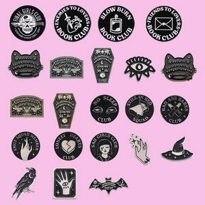Gothic punk black enamel pin set with geometric flame and occult mystery designs