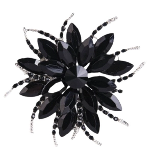 Fashion flower brooch with faceted black crystals and silver metallic wire on white background