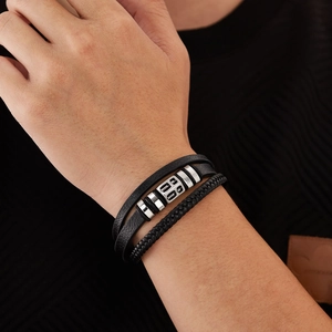 Men's multi-layer black leather bracelet with braided bands and silver metal accents