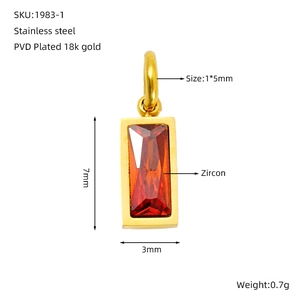 Detailed size specifications for a rectangular gold pendant with red zircon inlay