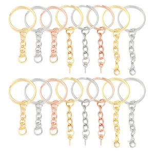Set of metal key ring accessories with chains in gold, silver and rose gold finishes