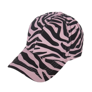 Detail of pink and black zebra print baseball cap with six-panel crown and curved brim