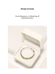 Detail of alternating yellow and white oval gemstones set in a silver metal jewelry ring