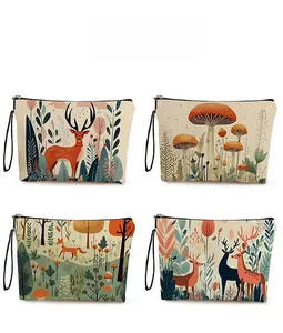 Detail showing four forest animal canvas pouches with zip closure and wristlet strap