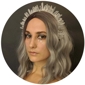 Elegant raw crystal crown headpiece for weddings and parties worn by a model