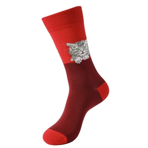 Detailed close-up of red cotton crew socks with cute cat embroidery and knit texture