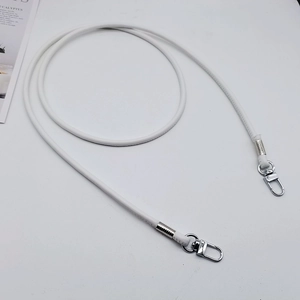 White PU leather shoulder strap detail featuring silver metal lobster clasps