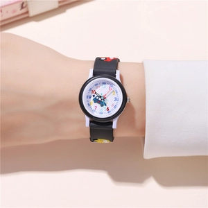Close-up of kids quartz watch featuring blue car pattern dial and black silicone strap