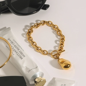 Elegant 18k gold plated stainless steel thick chain bracelet with OT toggle and droplet charm