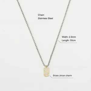 Detail of 18K gold-plated brass zircon charm with stainless steel pearl chain necklace