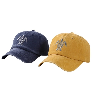 Vintage washed cotton baseball cap with embroidered sea turtle in navy and yellow