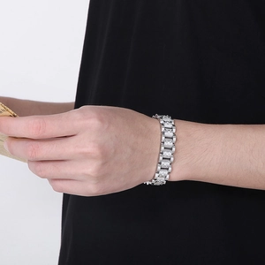 Macro detail of silver stainless steel hiphop bracelet with dense sparkling crystals
