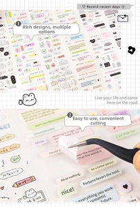 Detail of die-cut aesthetic scrapbooking stickers featuring inspirational quotes and animals