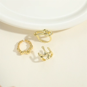 Three-piece set of 14K gold plated adjustable rings with twist and knot designs
