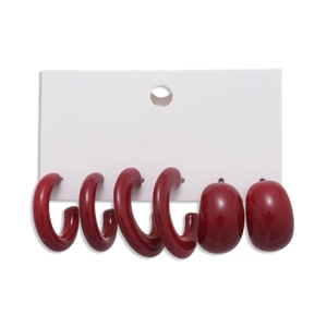 Six-piece set of deep red acrylic geometric C-shape hoop earrings and smooth oval studs