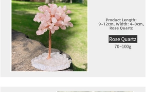 Macro view of handmade rose quartz tree with copper wire on a natural mineral base