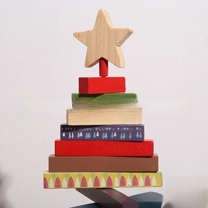 Detail view of the multi-colored stacked wooden blocks forming a Christmas tree decoration